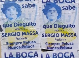 Los afiches en La Bombonera que aseguran que Maradona votaría a Massa